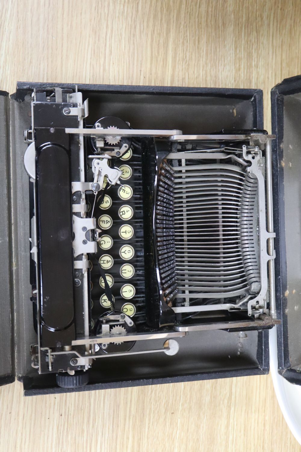 An early 20th century corona portable typewriter case